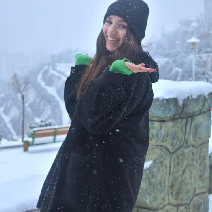 Liam Chen, Client Relations Director, discussing corporate gifting strategy with business clients